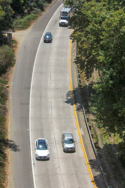 istock Cars Driving Down Highway 1360438311