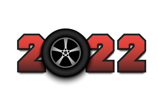 istock Happy New Year 2022 and car wheel 1360446768