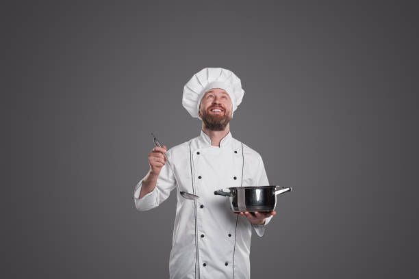 istock Adult male cook looking up 1360448689