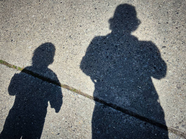 istock Father and child silhouette 1360458468