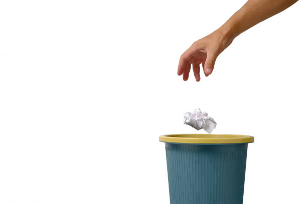 istock Sheet crumpled white paper is thrown into trash. 1360467273