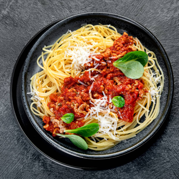 istock Spaghetti Bolognese on gray background. 1360470238