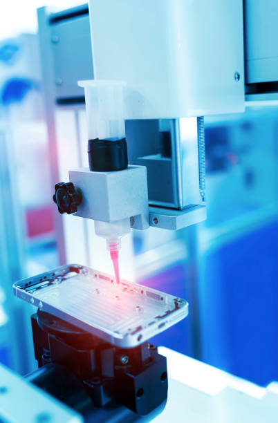 istock High precision and technology of nozzle device and needle of automatic glue dispenser machine (glue injection) for mobile phone 1360470371
