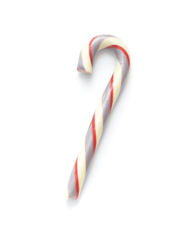 Closeup of a large Candy Cane on a white background.