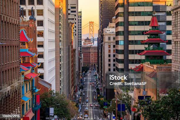 California Street Near China Town With The Bay Bridge At Sunset San Francisco Stock Photo - Download Image Now