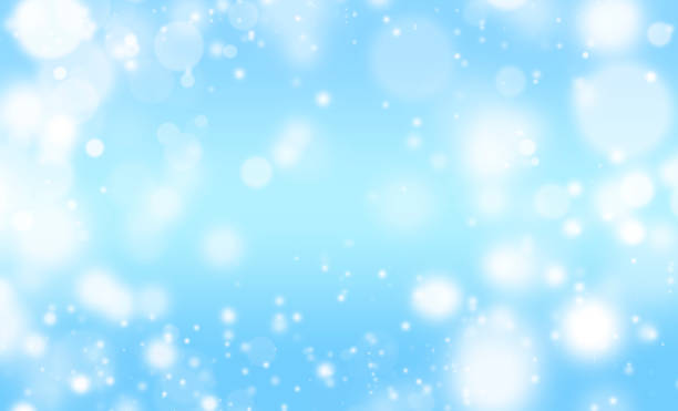 istock White Glitter Lights on Blue Texture Background. White Bokeh. Defocused, Celebration, Christmas Holiday Backdrop. 1360475478