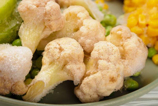 istock Close-up frozen vegetables cauliflower in plate 1360479356