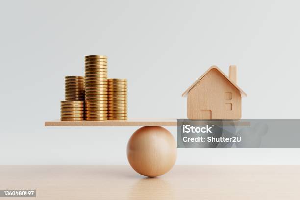 Wooden House And Golden Coin On Balancing Scale On White Background Real Estate Business Mortgage Investment And Financial Loan Concept Moneysaving And Cashflow Theme 3d Illustration Rendering Stock Photo - Download Image Now