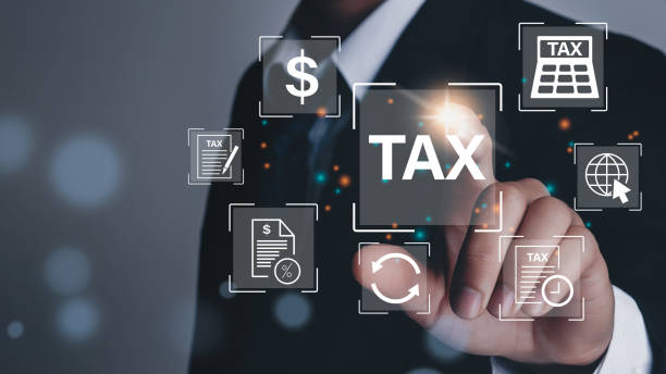 Business hand clicks virtual screen to tax return online for tax payment by corporations such as VAT, income tax, and property tax. stock photo