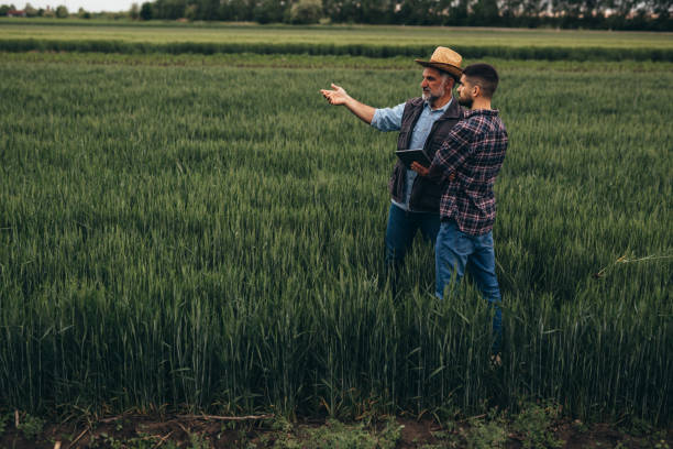 istock farmers talking outdoor 1360481454
