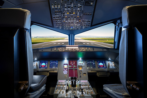 Inside the cockpit of a passenger aircraft