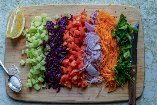 Preparing fresh healthy season salad