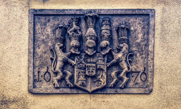 istock Medieval coat of arms inside building wall. 1360494135