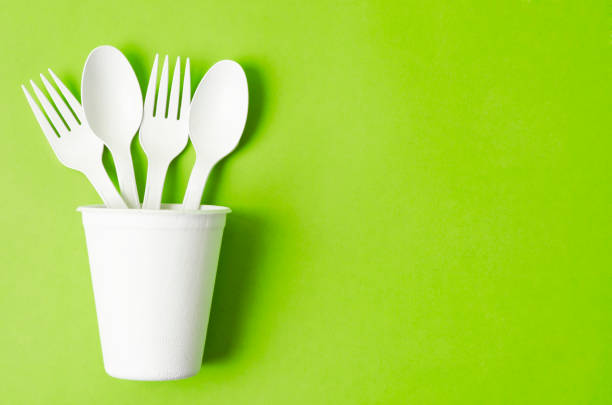 istock Biodegradable drinking glasses and cutlery environmentally friendly concept. 1360494201