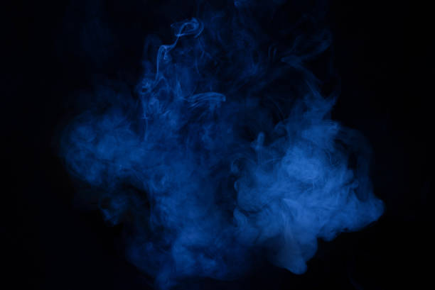 istock Blue and pink steam on a black background. 1360494420