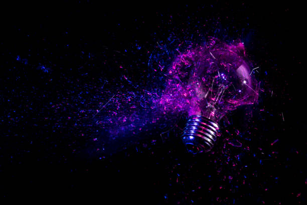 istock explosion of an electric light bulb on black. 1360502484