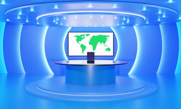 istock blue table on stand with led screen background in the news studio room.3d rendering. 1360503863