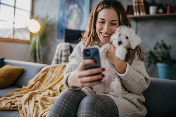 istock Selfie with puppy 1360505071