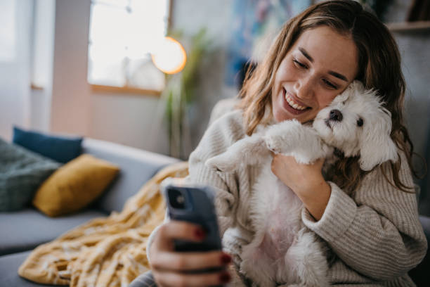 istock Selfie with puppy 1360505110