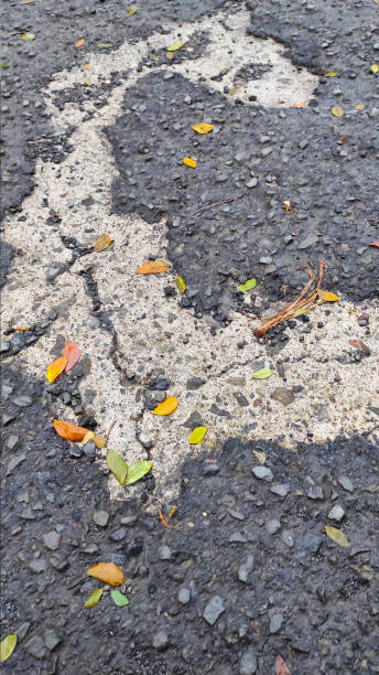 istock Eroded Asphalt - stock photo 1360506498