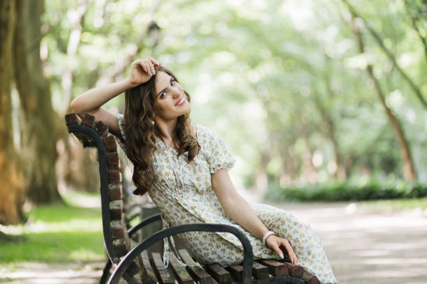 istock Happy woman with disability spending time at summer park 1360508027