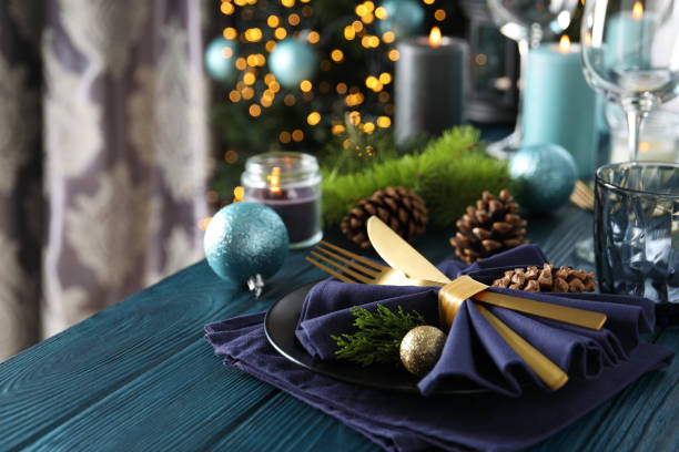 istock New Year table setting with bokeh on wooden table 1360508395