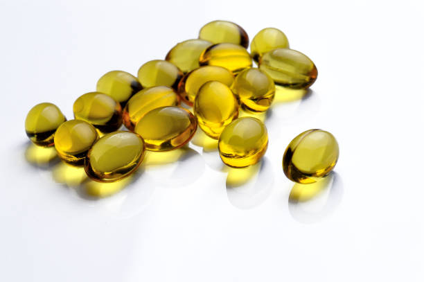 istock Omega 3 Fish Oil Supplement Capsules on a White Background. 1360509088