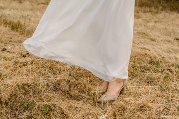 istock white dress that is fluttering in the wind. 1360511682