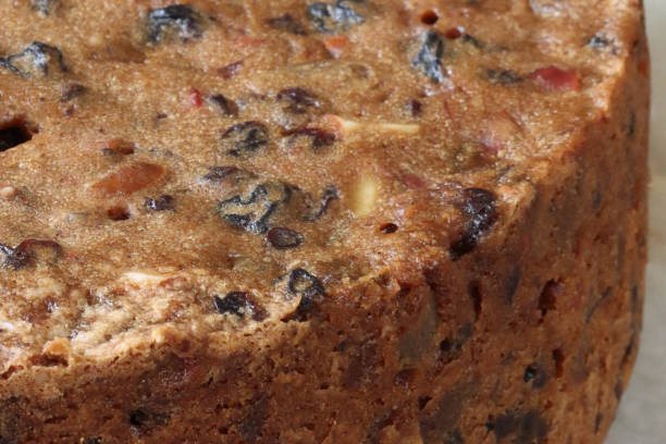 Traditional home made Christmas Cakes for sale at an English Christmas market.