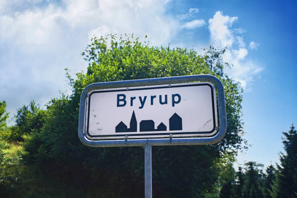 istock Bryrup city sign with green trees 1360518694