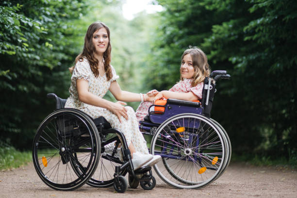 istock Pretty women with disability spending time at city park 1360519092