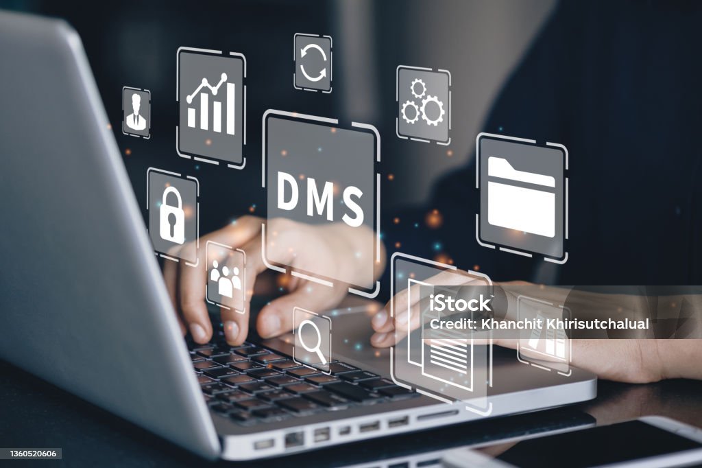Businessman using a computer to document management System concept, online documentation database and digital file storage system/software, records keeping, database technology, file access. German Deutschemarks Stock Photo