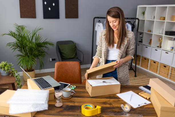 istock Working woman at online shop. 1360522736