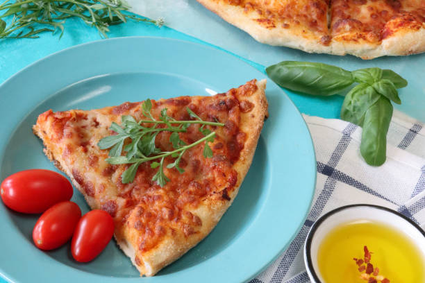 single slice of veggie pizza isolated on white background