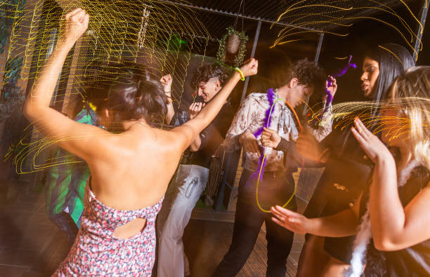 istock People having fun on a terrace at New Year Eve 1360525502