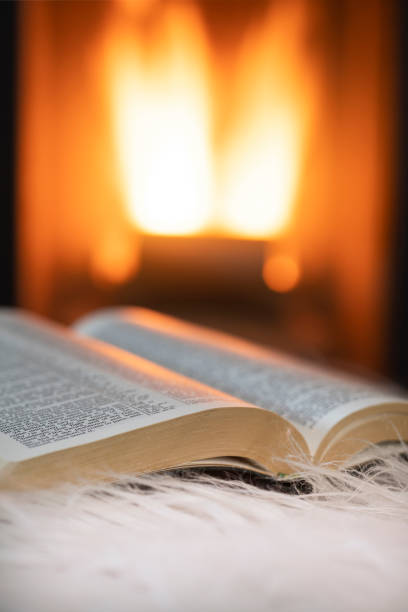 istock Evening at fireplace at home 1360525870