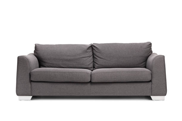 istock Studio shot of a grey sofa 1360527993