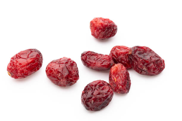 istock Dried cranberries isolated on white background 1360531311