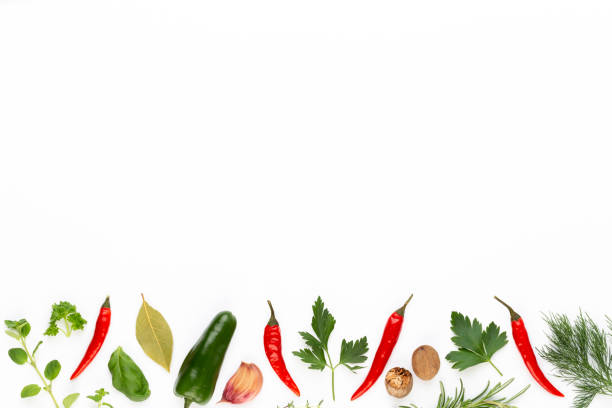 istock Spice herbal leaves and chili pepper on white background. Vegetables pattern. Floral and vegetables on white background. Top view, flat lay. 1360531404