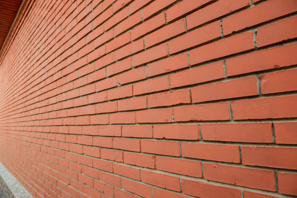 istock Old wall bricks of a house outdoor 1360534122