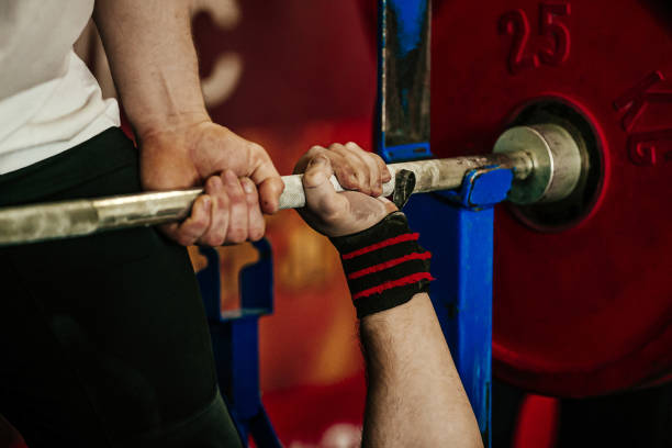 istock male athlete and barbell exercise bench press 1360545063