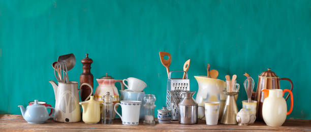 istock various vintage kitchen utensils and beautiful old crockery, panoramic, free copy space 1360546417
