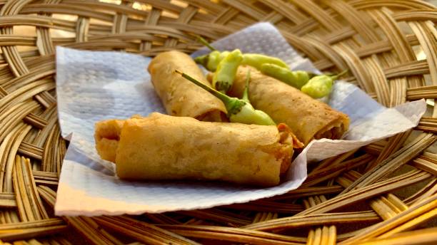 istock Indonesian spring roll called Lumpia served for snack 1360546561