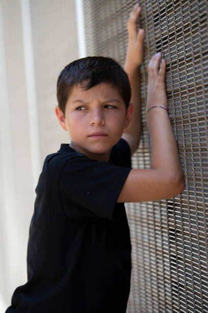 istock Portrait of a young school boy smiling 1360547500
