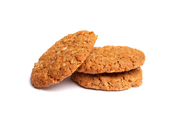 hafer-vanille-zucker-kekse isoliert auf weißem hintergrund. nahaufnahme - cookie sugar oatmeal isolated stock-fotos und bilder