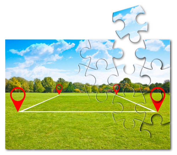 istock Land plot management - real estate concept with a vacant land on a green field available for building construction and housing subdivision in a residential area - puzzle shape concept 1360551523
