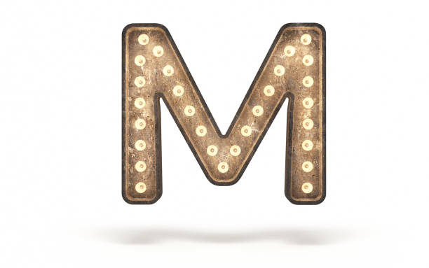 istock Letter M decorated with light bulb covered with concrete 1360558076