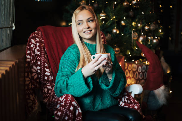 Pretty blonde woman in a cafe.