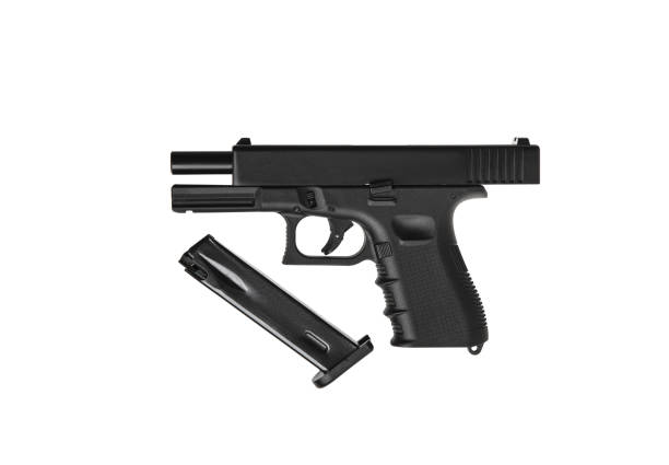 istock Modern semi-automatic pistol isolate on a white background. Armament for the army and police. Short-barreled weapon. 1360559012