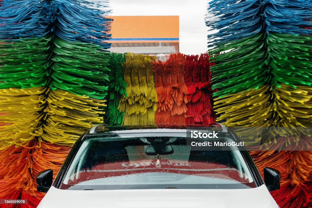 Car being washed A car being washed in an automatic machine Car Wash Stock Photo